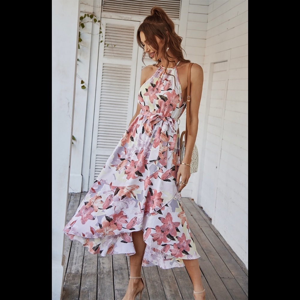 Halter neck floral print ruffle dress.
